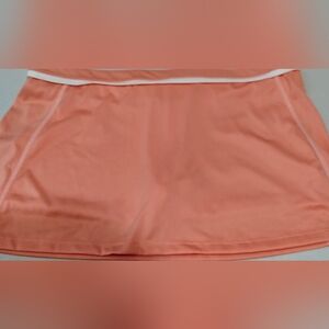 NEW WITH TAGS Bollé Peach Skirt with White Trim And Built In Shorts.